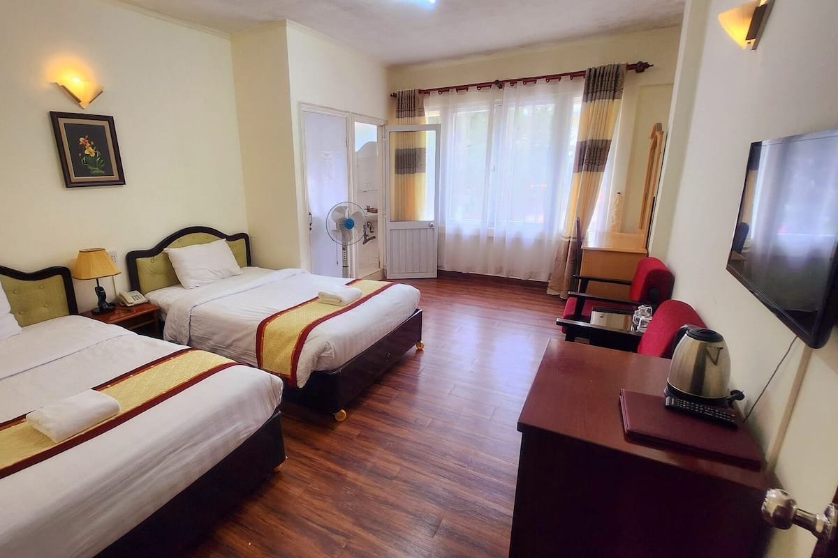 Deluxe Quadruple Room | WiFi (free), individually decorated, individually furnished, bed sheets