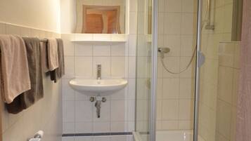 Economy Double Room | Bathroom | Shower, towels, soap, toilet paper