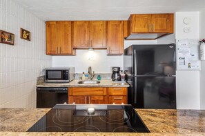 Luxury Condo | Private kitchen | Full-sized fridge, microwave, oven, stovetop