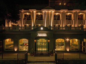 A building with a prominent entrance, multiple windows, and a sign reading 'MURABBA The Dining Lounge'. - The Metropole by Keyboard Hotels (Mawal)