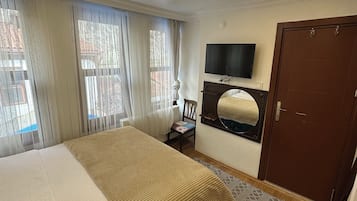 Habitación doble clásica | Minibar, wifi gratis y ropa de cama