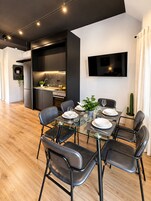Apartamento superior (44) | Zona de estar | Una televisión de pantalla plana