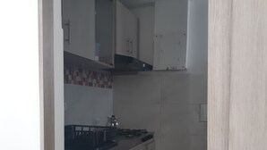 Coffee/tea maker, fridge, stovetop, dishwasher
