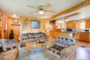 Fireplace, books - Cozy Bay City Abode w/ Deck & Fire Pit, Near Lakes (Bay City)