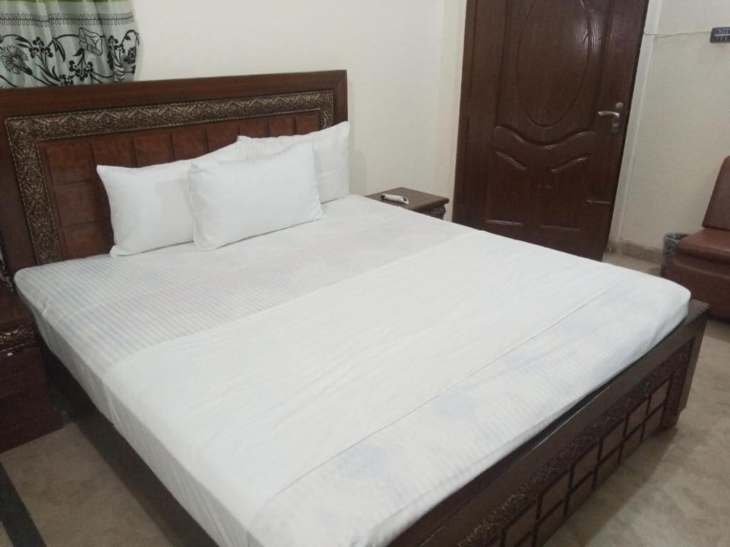 Habitación doble Deluxe | Tabla de planchar con plancha y wifi gratis 