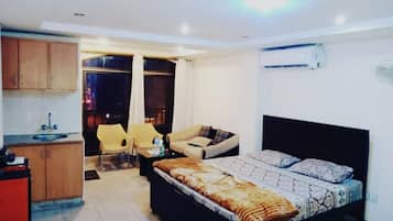 Apartemen Deluks | 1 kamar tidur, setrika/meja setrika, dan Wi-Fi gratis