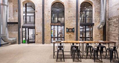 Flexhome Brewery District 2-Story 2BR Apt Near Fiserv with Rooftop, Gym, and Parking