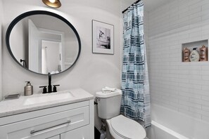 Hair dryer, towels, soap, shampoo