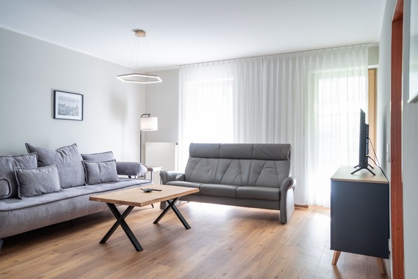 Apartamento superior | Área de estar | Smart TV