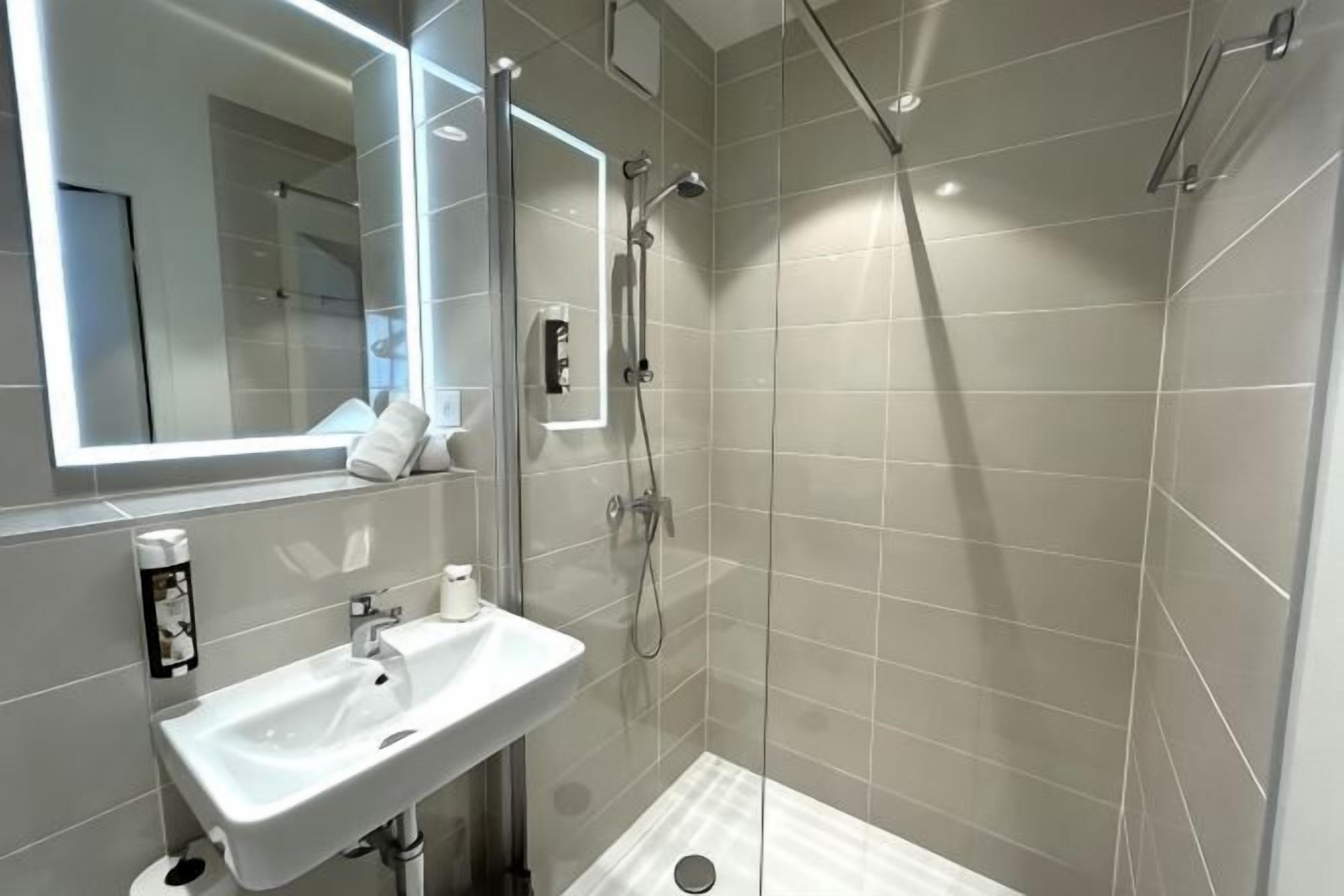 Bathroom | Shower, hair dryer, towels
