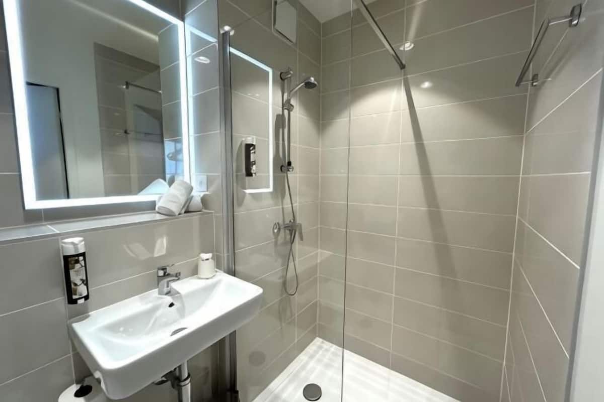 Bathroom | Shower, hair dryer, towels
