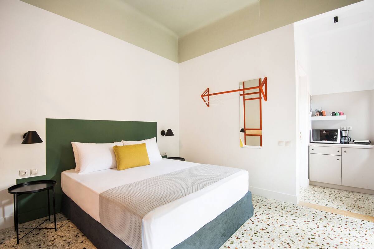 City Quadruple Room | Living area | Flat-screen TV