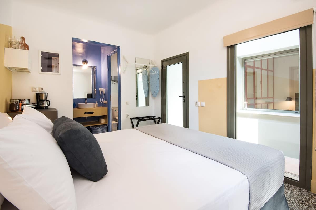 Basic Double Room | Living area | Flat-screen TV
