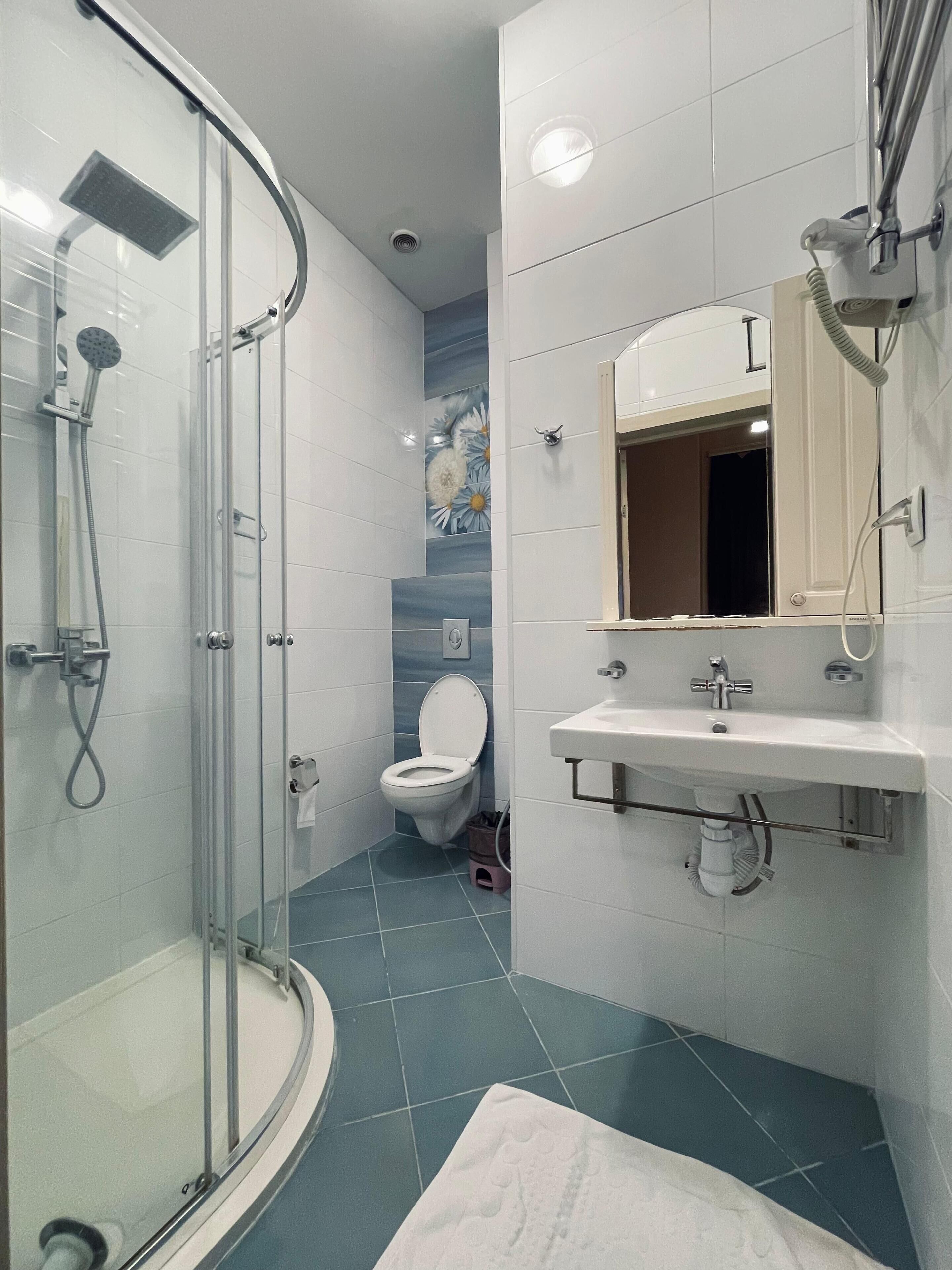 Shower, free toiletries, hair dryer, bathrobes