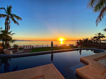 Sunrise over the ocean and east facing pool.
