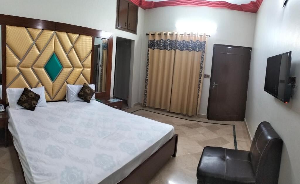 Habitación Deluxe doble | Tabla de planchar con plancha y wifi gratis