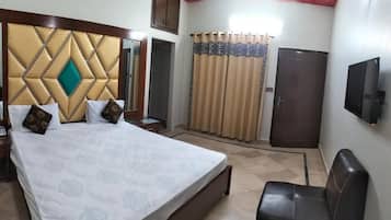 Habitación Deluxe doble | Tabla de planchar con plancha y wifi gratis