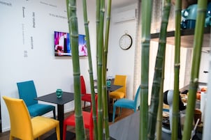 Premium Double Room | Living area | 32-inch Smart TV with cable channels, Netflix, streaming services