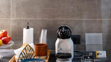 Mini-fridge, microwave, stovetop, cookware/dishes/utensils