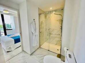 Shower, hair dryer, towels, soap
