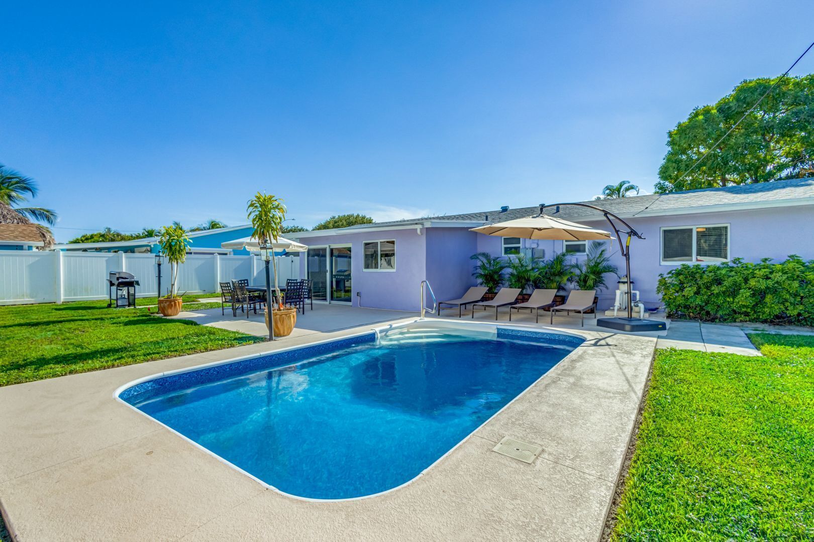Beautifully remodeled pool home close to beaches, restaurants, and activities. 