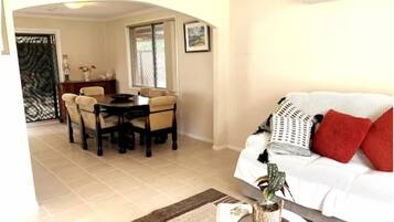 Family Villa | Living area | Flat-screen TV