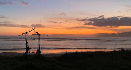 Artist Magical Hideaway on Makorori Beach. Awesome views and sunsets.