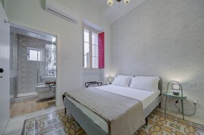 Shower, eco-friendly toiletries, hair dryer, towels
