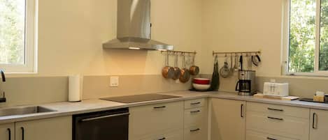 Fridge, stovetop, coffee/tea maker, electric kettle