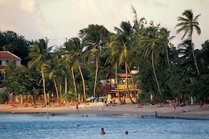 On the beach, sun loungers, beach towels