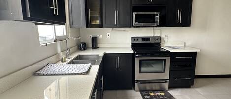 Fridge, microwave, oven, stovetop