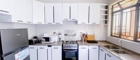 Fridge, microwave, oven, stovetop