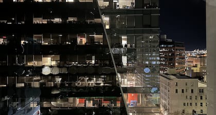 "Luxurious Downtown Condo with Jetted Jacuzzi & Workspace - Business District"