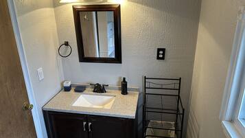 Hair dryer, towels, soap, shampoo