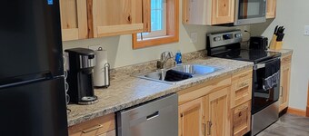 Former bar with games, multiple kitchens, 5 bedrooms, sleeps 14. 