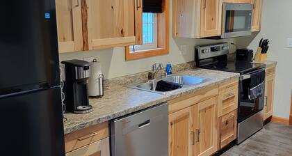 Former bar with games, multiple kitchens, 5 bedrooms, sleeps 14.