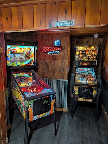 Former bar with games, multiple kitchens, 5 bedrooms, sleeps 14. 