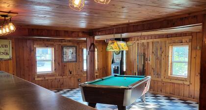 Former bar with games, multiple kitchens, 5 bedrooms, sleeps 14.