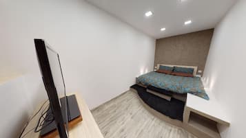 1 slaapkamer, een strijkplank/strijkijzer, gratis wifi, beddengoed