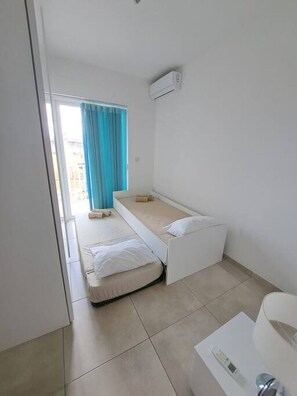 2 slaapkamers, een strijkplank/strijkijzer, wifi, beddengoed