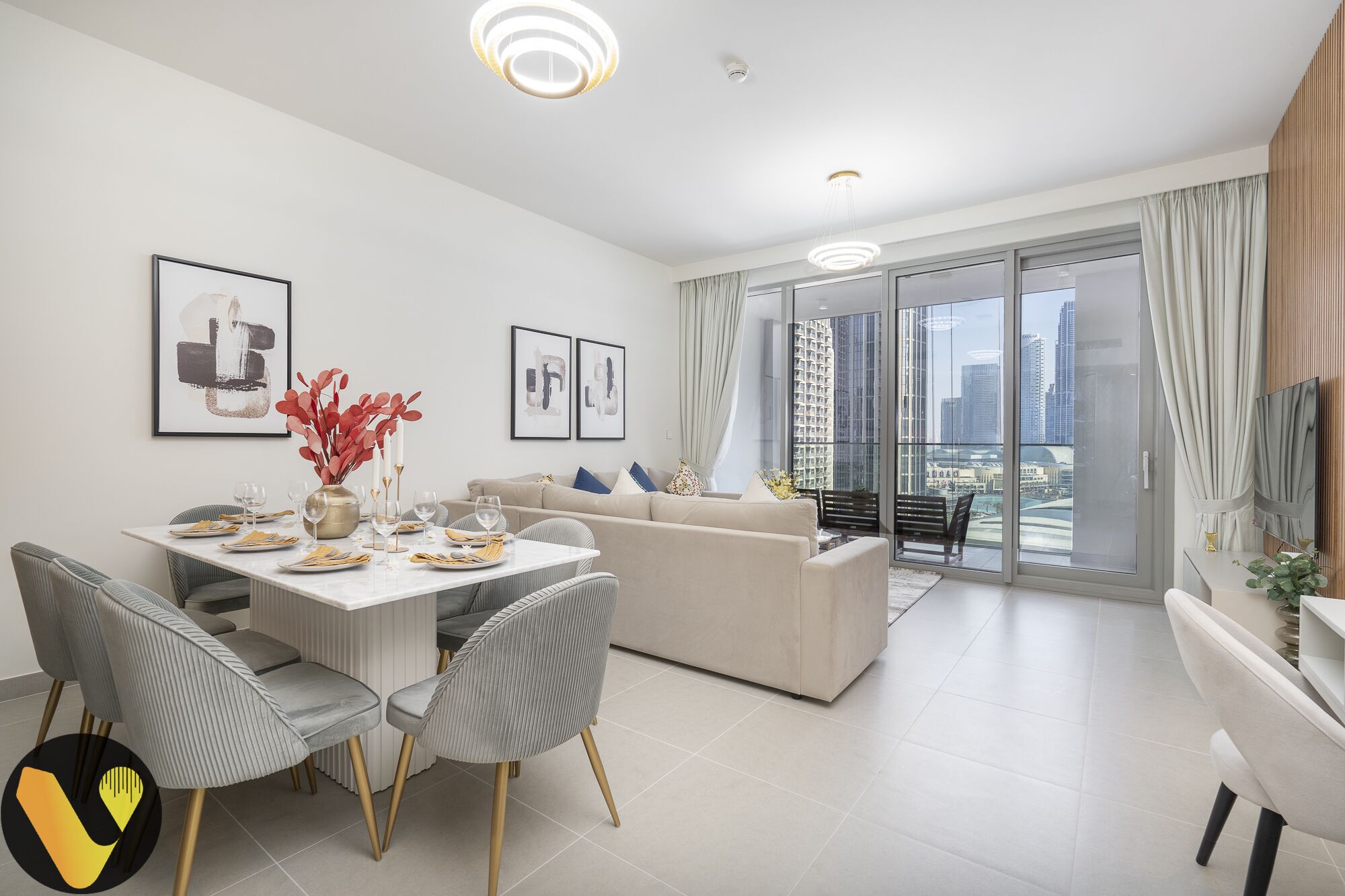 Elite Apartment | Living area | 65-inch Smart TV with cable channels, table football