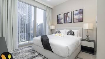 Elite Apartment | Egyptian cotton sheets, premium bedding, in-room safe