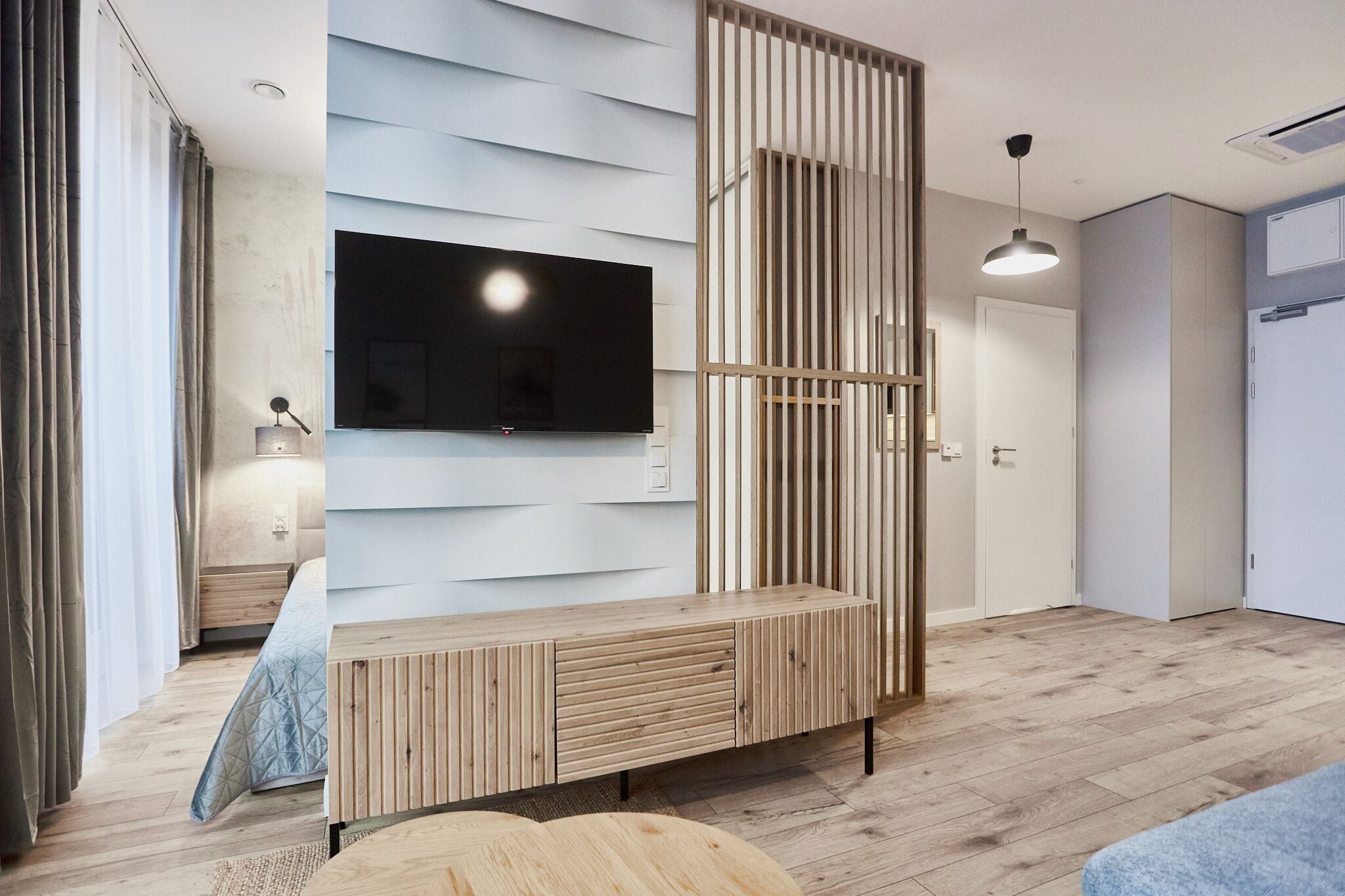 Superior Apartment | Living area | 14-inch LCD TV with cable channels