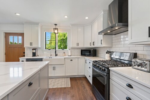 Amazing new construction in this beautiful home, walk to Rodger Wheeler Beach.