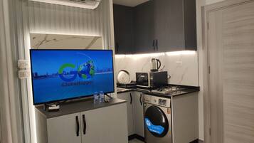 Apartamento City | Zona de estar