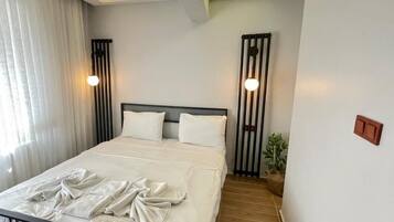 1 bedroom, laptop workspace, blackout curtains, soundproofing