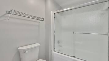 Hair dryer, towels, soap, shampoo