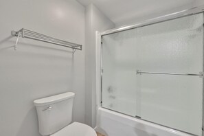 Hair dryer, towels, soap, shampoo