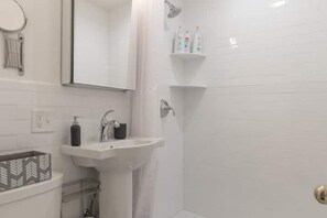 Hair dryer, towels, soap, shampoo