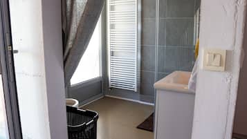 Shower, towels, toilet paper